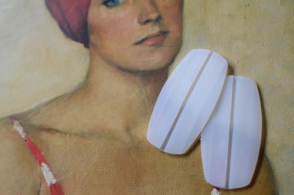 Podložky pro rozložení váhy ramínek